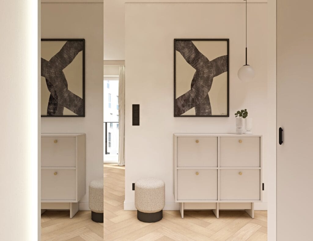 Minimalistyczny przedpokój w stylu skandynawskim z jasną szafką i dekoracją ścienną