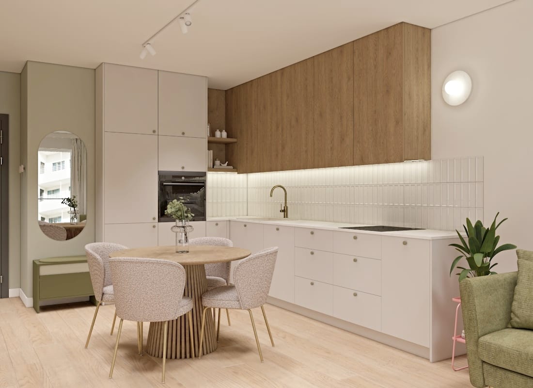 Nowoczesna kuchnia w bieli i jasnych odcieniach z drewnianymi elementami i szałwiową zielenią jako akcentem. Elegancka przestrzeń łącząca naturalne materiały z subtelnymi kolorami.